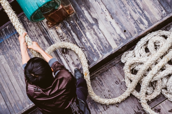 Man pulling rope